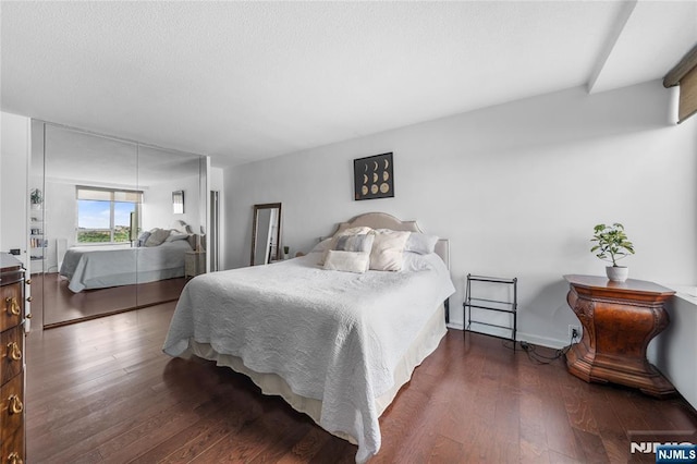 3 Horizon Unit 801, Fort Lee, NJ 07024 - bedroom featuring hardwood / wood-style flooring and baseboards