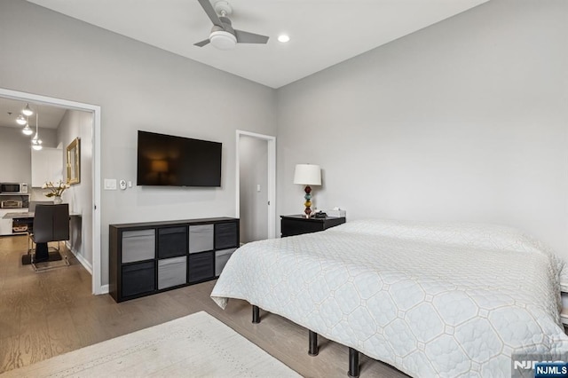240 Main St Unit 211, Little Falls, NJ 07424 - bedroom with wood finished floors, a ceiling fan, baseboards, and recessed lighting
