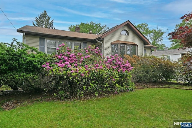 64 Rivervale Rd, Park Ridge, NJ 07656 - single story home featuring a chimney and a front yard