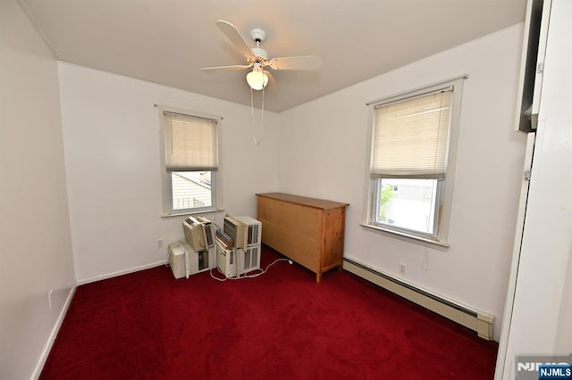 64 Rivervale Rd, Park Ridge, NJ 07656 - carpeted spare room featuring baseboard heating, plenty of natural light, a ceiling fan, and baseboards