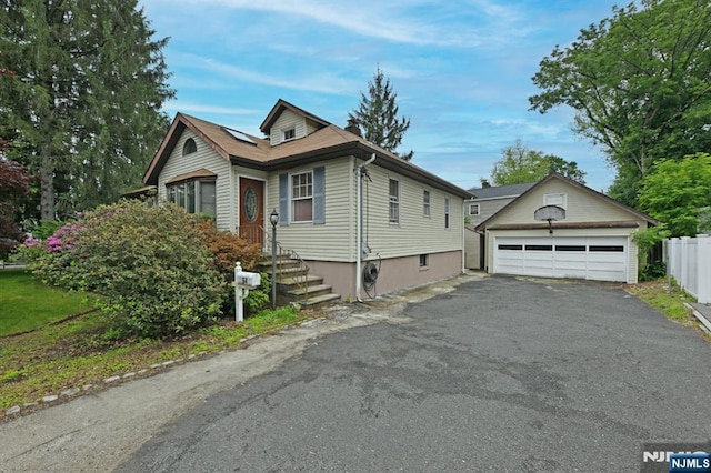 64 Rivervale Rd, Park Ridge, NJ 07656 - view of front of property with an outbuilding and a garage