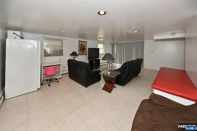 64 Rivervale Rd, Park Ridge, NJ 07656 - living area with recessed lighting and a baseboard heating unit
