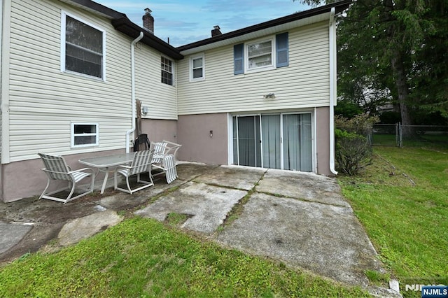 64 Rivervale Rd, Park Ridge, NJ 07656 - back of house with a patio area and a chimney