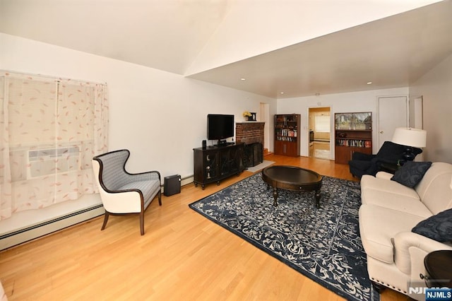 64 Rivervale Rd, Park Ridge, NJ 07656 - living area featuring wood finished floors, vaulted ceiling, and a baseboard heating unit