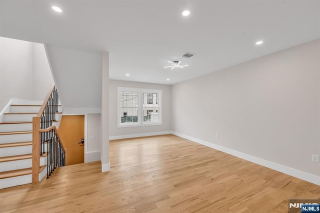 15 Monroe St, Garfield, NJ 07026 - unfurnished living room featuring wood finished floors, baseboards, recessed lighting, stairs, and ceiling fan