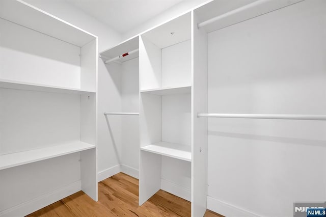 15 Monroe St, Garfield, NJ 07026 - spacious closet with light wood-type flooring