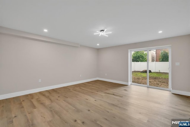 15 Monroe St, Garfield, NJ 07026 - spare room featuring baseboards, recessed lighting, and light wood finished floors