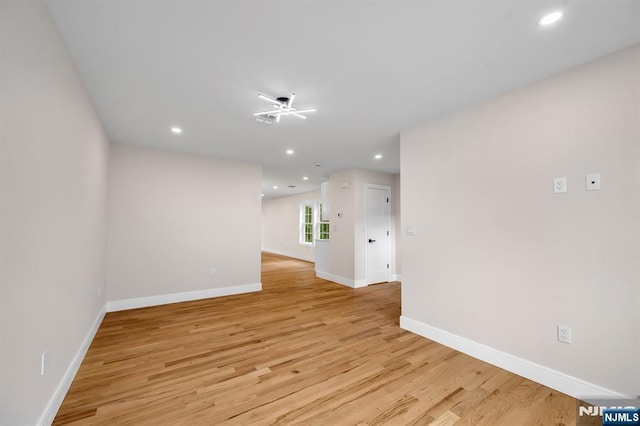15 Monroe St, Garfield, NJ 07026 - unfurnished room featuring light wood-style flooring, baseboards, and recessed lighting