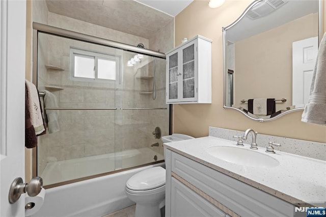 51 Sunrise Ter, Cedar Grove, NJ 07009 - bathroom with toilet, vanity, and shower / bath combination with glass door