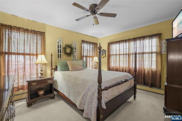51 Sunrise Ter, Cedar Grove, NJ 07009 - bedroom with carpet flooring, baseboard heating, and ceiling fan