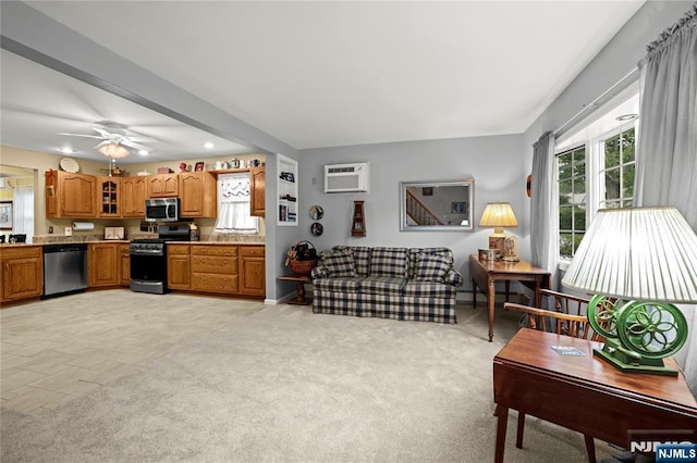 51 Sunrise Ter, Cedar Grove, NJ 07009 - living area with an AC wall unit, healthy amount of natural light, ceiling fan, baseboards, and recessed lighting