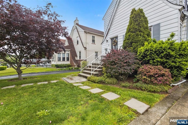 21 Berkeley Ave, Belleville, NJ 07109 - view of front of home featuring a front lawn