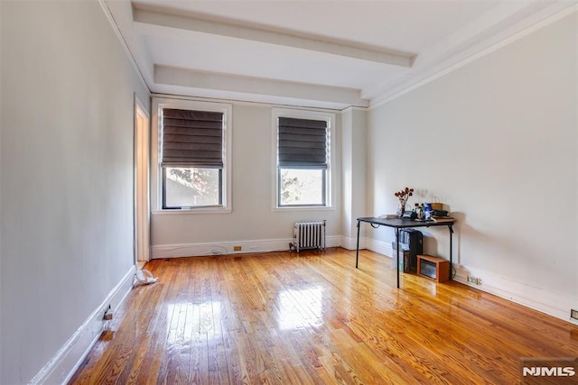 363-37 Mount Prospect Unit 2Aw, Newark, NJ 07104 - spare room featuring radiator, wood-type flooring, and baseboards
