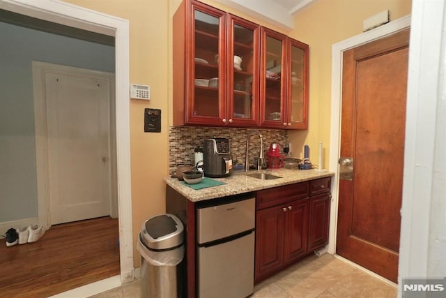 363-37 Mount Prospect Unit 2Aw, Newark, NJ 07104 - bar area with refrigerator, a sink, and backsplash
