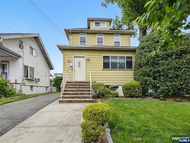 685 Maple Ave, Ridgefield, NJ 07657 - traditional style home featuring entry steps and a front lawn