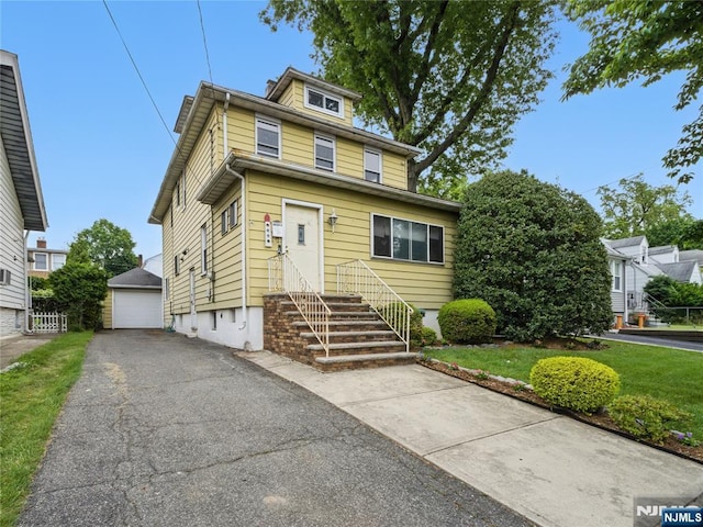 685 Maple Ave, Ridgefield, NJ 07657 - traditional style home with an outdoor structure and a garage