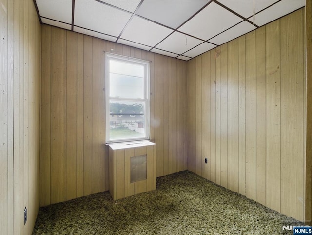 685 Maple Ave, Ridgefield, NJ 07657 - carpeted spare room with wooden walls