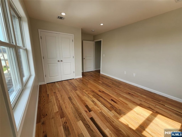 510 Anthony Ct, Lyndhurst, NJ 07071 - unfurnished bedroom featuring baseboards, wood finished floors, a closet, and recessed lighting
