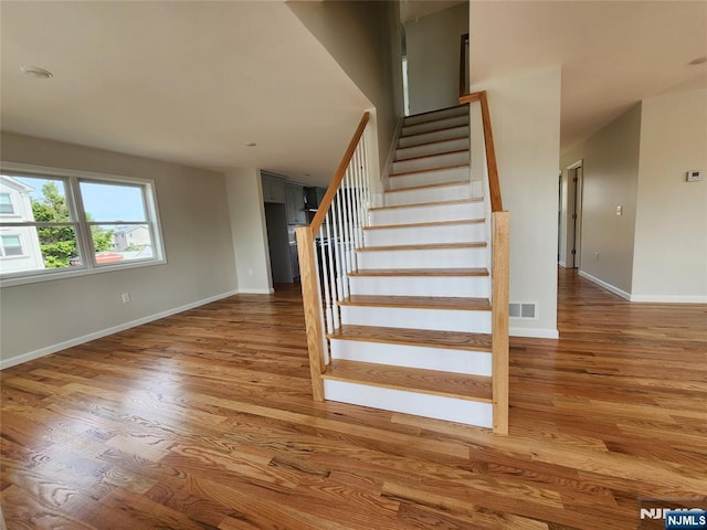 510 Anthony Ct, Lyndhurst, NJ 07071 - stairway featuring wood finished floors and baseboards