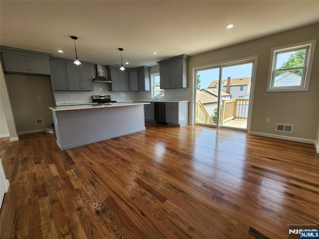 510 Anthony Ct, Lyndhurst, NJ 07071 - kitchen with wall chimney range hood, gray cabinetry, stainless steel range oven, light countertops, and recessed lighting