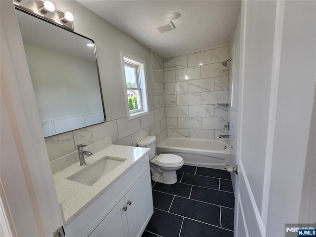 510 Anthony Ct, Lyndhurst, NJ 07071 - full bath with vanity, toilet, tile patterned flooring,  shower combination, and tile walls