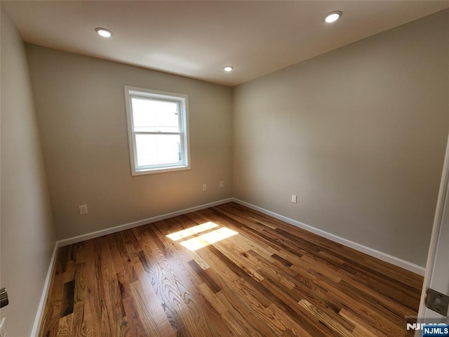 510 Anthony Ct, Lyndhurst, NJ 07071 - unfurnished room featuring wood finished floors, baseboards, and recessed lighting