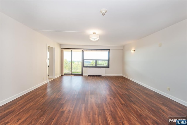 2 Clairidge Unit 3Nw, Verona, NJ 07044 - empty room featuring baseboards and dark wood-style floors
