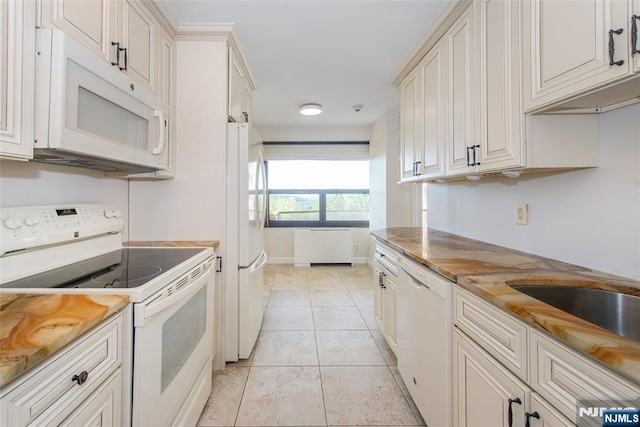 2 Clairidge Unit 3Nw, Verona, NJ 07044 - kitchen with white appliances, light tile patterned flooring, baseboards, and butcher block countertops