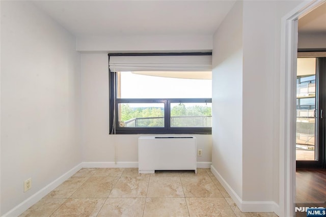 2 Clairidge Unit 3Nw, Verona, NJ 07044 - spare room with radiator and baseboards
