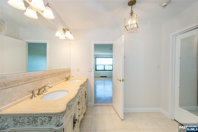2 Clairidge Unit 3Nw, Verona, NJ 07044 - full bathroom featuring double vanity, tile patterned floors, and baseboards