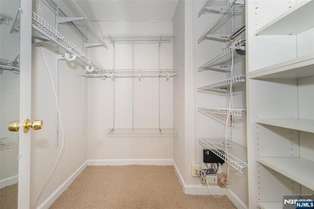 2 Clairidge Unit 3Nw, Verona, NJ 07044 - walk in closet featuring carpet flooring
