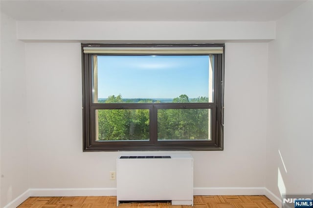 2 Clairidge Unit 3Nw, Verona, NJ 07044 - unfurnished room with radiator and baseboards