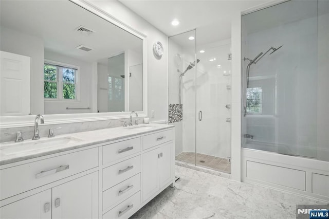 43 Lawrence Pkwy, Tenafly, NJ 07670 - full bath featuring a shower stall, double vanity, recessed lighting, and marble finish floors