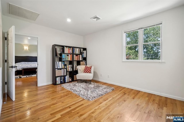 43 Lawrence Pkwy, Tenafly, NJ 07670 - living area with light wood-style floors and recessed lighting