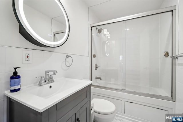 43 Lawrence Pkwy, Tenafly, NJ 07670 - full bath featuring enclosed tub / shower combo, vanity, and tile walls