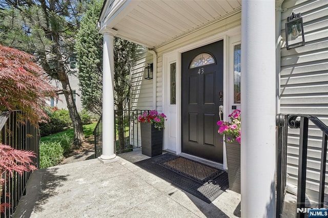 43 Lawrence Pkwy, Tenafly, NJ 07670 - doorway to property featuring a porch