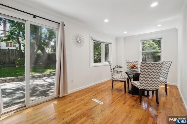 43 Lawrence Pkwy, Tenafly, NJ 07670 - dining room featuring ornamental molding, healthy amount of natural light, light wood-style flooring, and recessed lighting