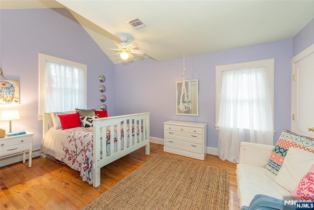 449 E Valley Rd, Montclair, NJ 07043 - bedroom with light wood finished floors, baseboard heating, vaulted ceiling, and a ceiling fan