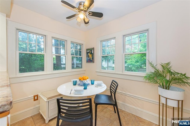 449 E Valley Rd, Montclair, NJ 07043 - dining area with light tile patterned floors, baseboards, and a ceiling fan