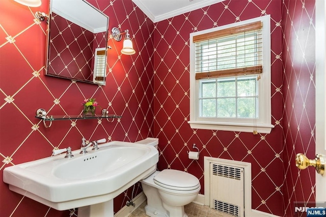 9 Stonewood Pkwy, Verona, NJ 07044 - half bath featuring radiator, toilet, ornamental molding, a sink, and tile patterned flooring