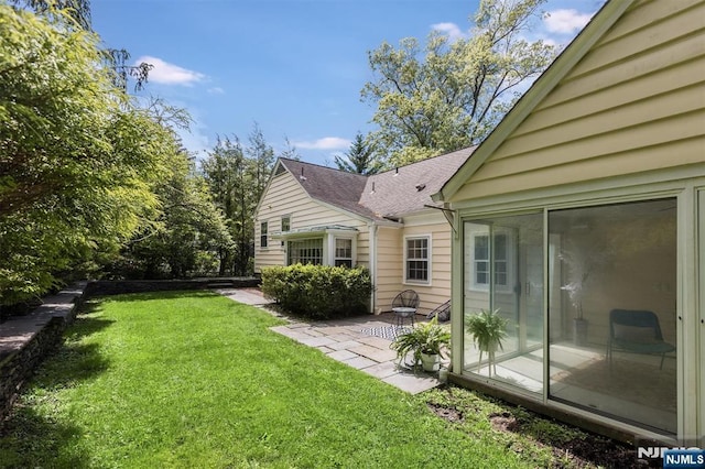 9 Stonewood Pkwy, Verona, NJ 07044 - view of green lawn featuring a patio area