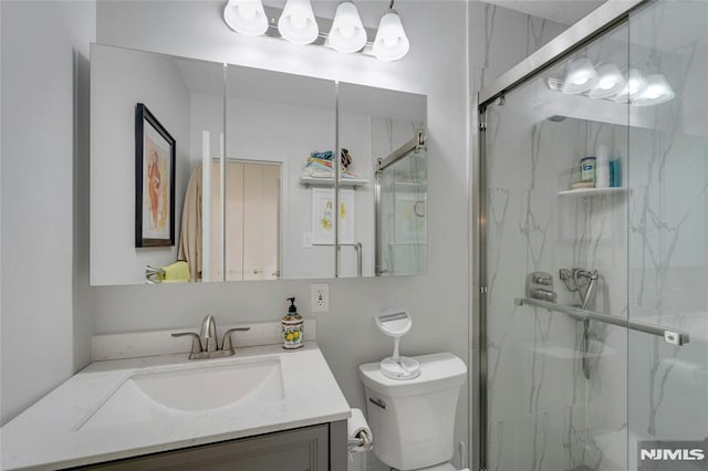 1530 Palisade Ave Unit 21M, Fort Lee, NJ 07024 - bathroom featuring vanity and a marble finish shower