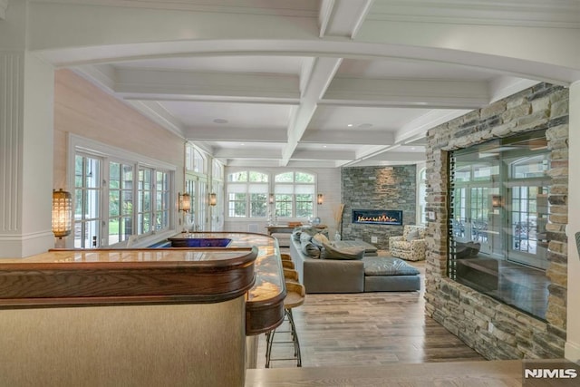 20 W Crescent Ave, Mahwah, NJ 07430 - bar with beam ceiling, coffered ceiling, wood finished floors, and a stone fireplace