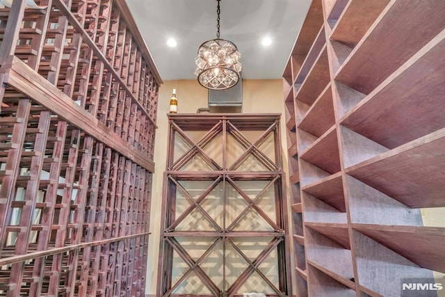 20 W Crescent Ave, Mahwah, NJ 07430 - wine room with recessed lighting and a chandelier