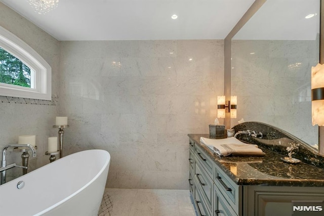 20 W Crescent Ave, Mahwah, NJ 07430 - bathroom featuring a freestanding tub and tile walls
