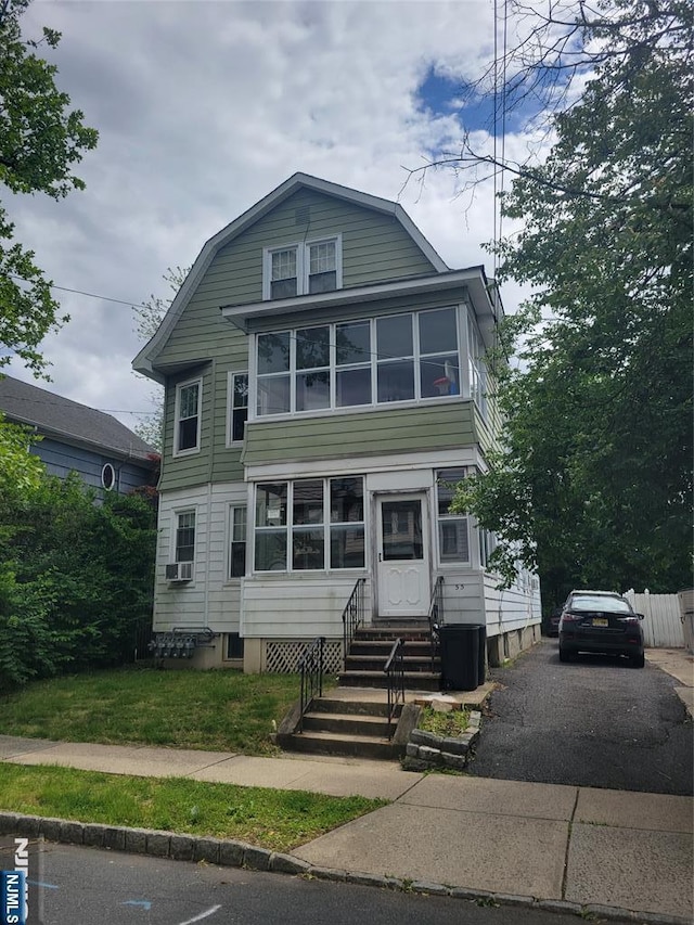 55 James, Bloomfield, NJ 07003 - dutch colonial featuring entry steps, a gambrel roof, cooling unit, and driveway