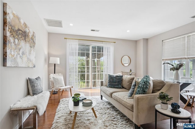 443 2nd St Unit 412, Jersey City, NJ 07302 - living area with healthy amount of natural light, wood finished floors, recessed lighting, and baseboards