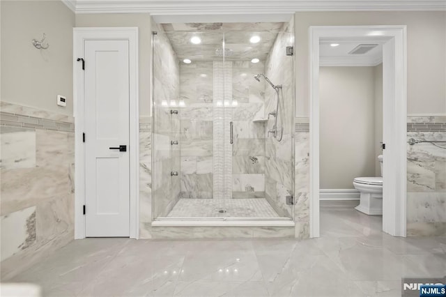 504 Kendrick St, Paramus, NJ 07652 - bathroom with crown molding, toilet, marble finish floors, tile walls, and a marble finish shower
