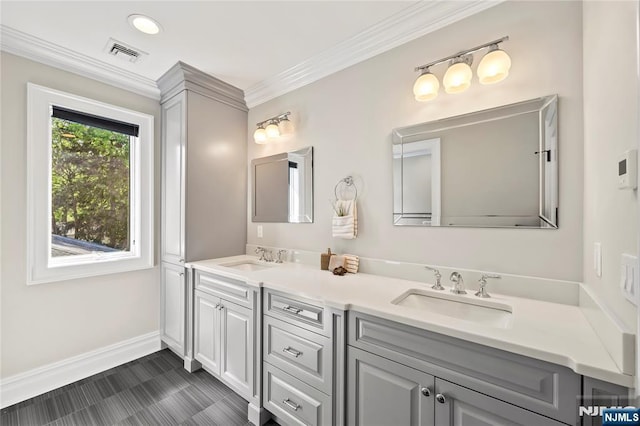 504 Kendrick St, Paramus, NJ 07652 - bathroom with double vanity, baseboards, and ornamental molding