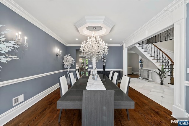 504 Kendrick St, Paramus, NJ 07652 - dining room with stairway, a chandelier, crown molding, wood finished floors, and recessed lighting